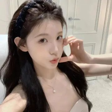梁女士